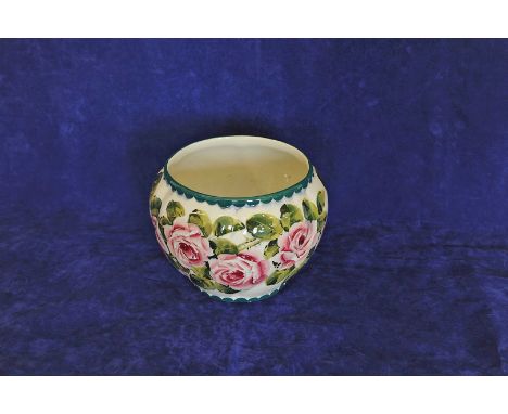 A Wemyss bowl with rose decoration to the shaped swept body. 6¾ins high. 