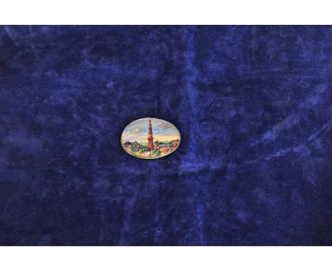 A portrait miniature of a tower with surrounding buildings, detail to the reverse 'Kutub Minar Delhi'. 