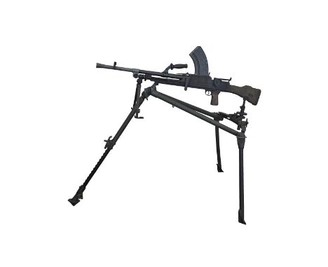 A Bren .303 light machine gun with attached Bipod, Tripod and original wooden box with magazine, pull-through cleaner and can