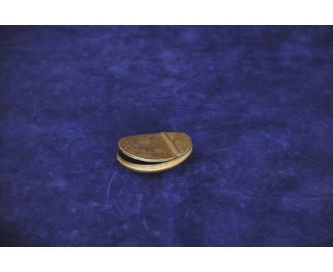 A brass snuff box of oval domed form with star decorated exterior surrounded by scrolls, the reverse with name 'R Paget'. 