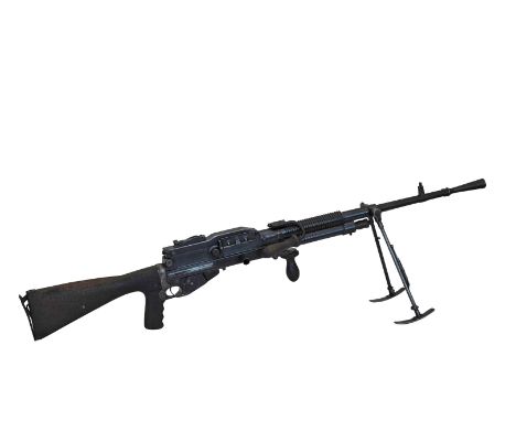 A Hotchkiss .303 light machine gun with attached tripod. 