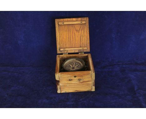 An oak cased ships compass in a gimble by Gilbert & Sons, London. 