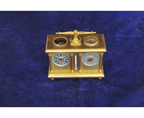 An early 20th century French carriage desk timepiece / weather station with carrying handle and circular bevelled glass panel