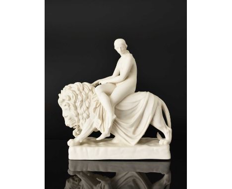 A Minton parian figural group of Una and the Lion after a model by John Bell (1812-1895), the nude figure seated astride a ma