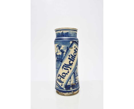 A Spanish (Catalonia) faience albarello, 17th century, painted in blue with a single female figure beside a landscape with a 