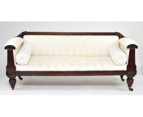 A William IV mahogany upholstered sofaThe reeded top rail with acanthus terminals, the scroll arms with Ionic style carved fa