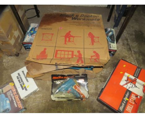 A selection of boxed Black &amp; Decker power tools and a workmate etc 