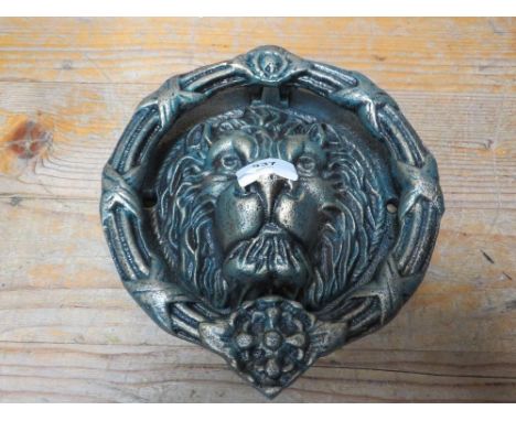 A lion head door knocker**