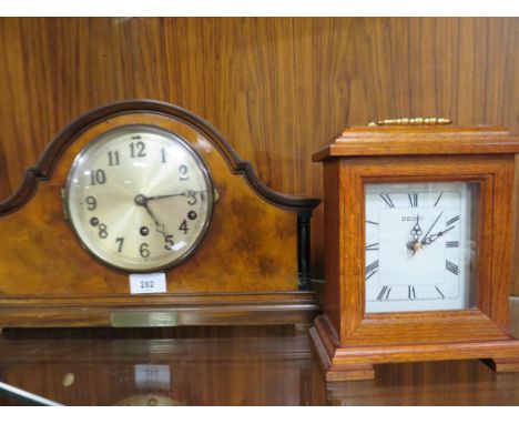 A vintage mantle clock with a smaller modern example (2) 