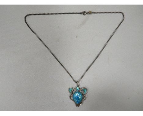 A hallmarked silver and enamel Art Nouveau pendant with chain 
