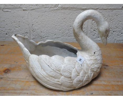 A cast iron swan planter**