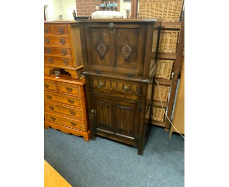 A small oak carved drinks cabinet W 64 cm 