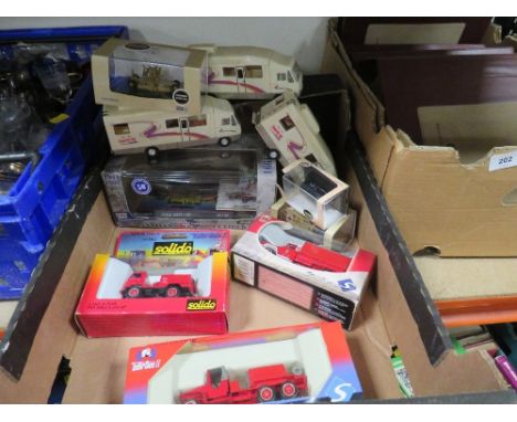 Four boxed Solido military vehicles, three boxed Oxford military vehicles and three plastic camper vans