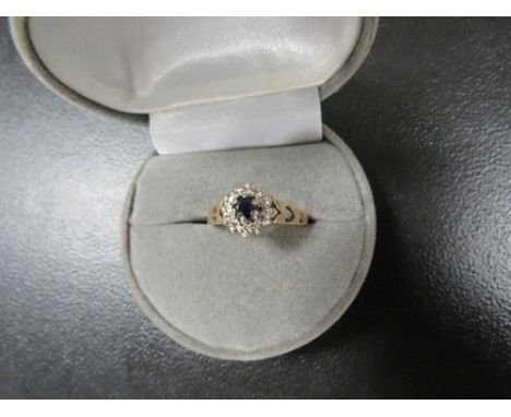 A hallmarked 9 carat gold sapphire and diamond ring approx. weight 2.2g 
