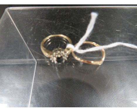 A hallmarked 9 carat gold sapphire and diamond ring together with a hallmarked 9 carat gold wishbone example approx. combined