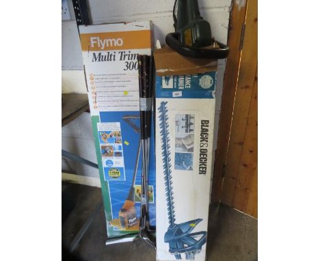Two boxed electrical garden tools to include a  Flymo strimmer and a Black &amp; Decker hedge trimmer 
