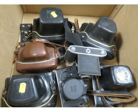 A box of vintage cameras 