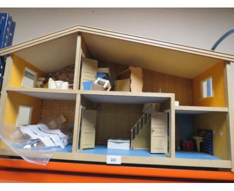 A vintage dolls house with contents A/F together with a vintage Triang baby walker brick set A/F 