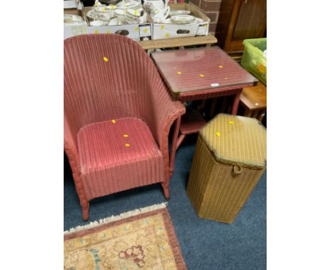 A vintage Lloyd Loom chair with a table and linen bin. (3) 