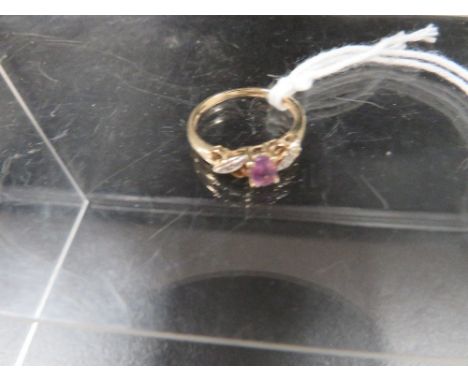 A hallmarked 9 carat gold amethyst and diamond ring approx. weight 1.9g 