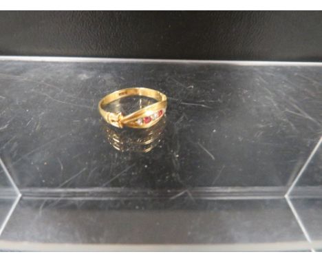 An 18ct ruby and diamond ring approx. weight 2.3g 