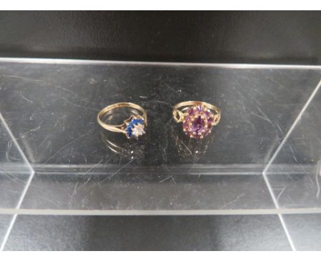 A hallmarked 9 carat gold ring set with amethyst style stone ring approx. weight 2g together with a hallmarked 9 carat gold d