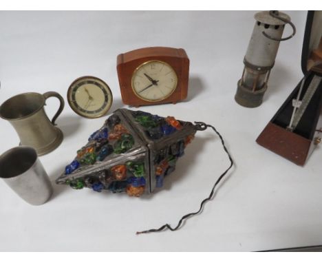 A tray of collectables to include miners lamp. metronome, clock etc