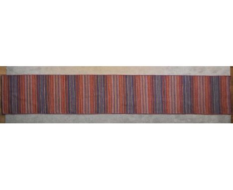 A contemporary Kilim runner with polychrome linear design. L.400x70cm 