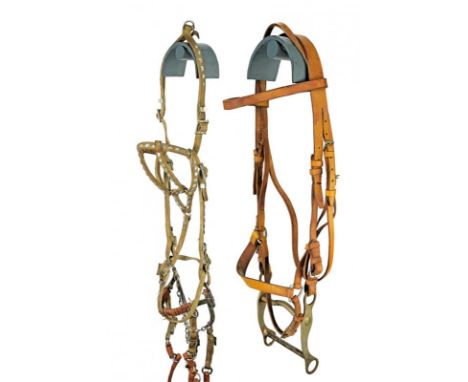 dating: 20th Century provenance: South America, A set of light leather bridles, with metal, articulated brake. Complete with 