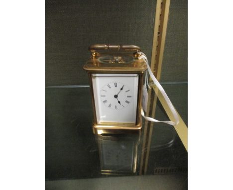 A gilt brass carriage clock, gong striking movement, later platform escapement  