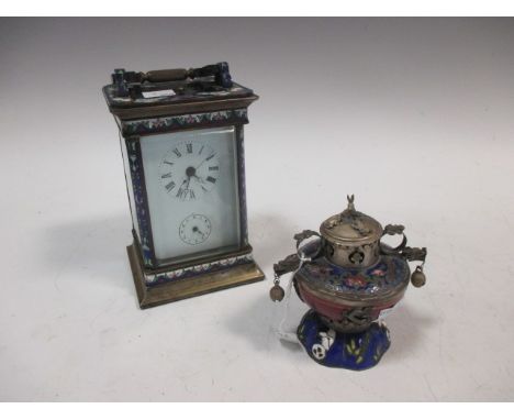 An Oriental cloisonne carriage clock with subsdsidiary dial and an Oriental incense burner  