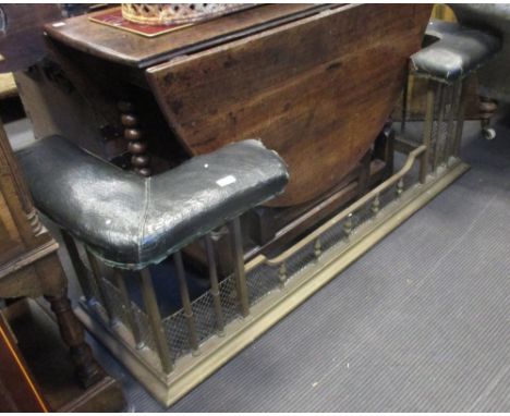 An Edwardian club fender with leatherette padded seats, (internal)115cm, (external) 150cm  