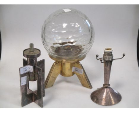 An Argentor brass and glass lamp marked as made in Austria, a silver lamp base stamped mark, and a lamp base stamped Ravinet 