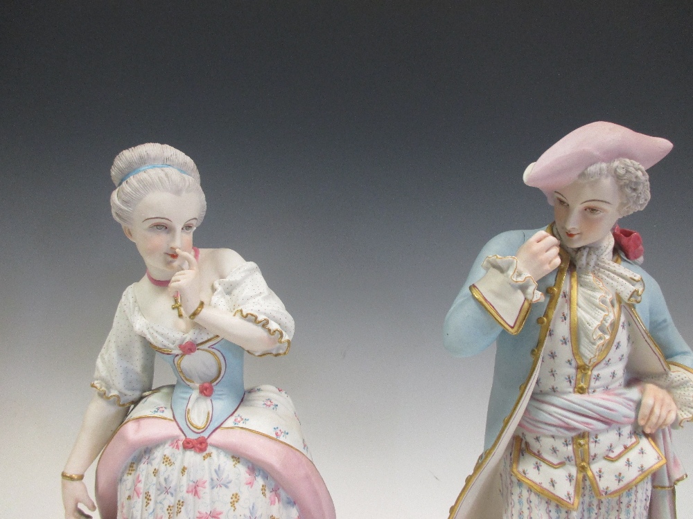 A pair of 19th century French bisque figures