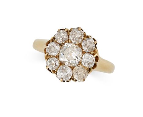 A FINE ANTIQUE DIAMOND CLUSTER RING in yellow gold, set with old cut diamonds, no assay marks, size K1/2 / 5.5, 4.1g.