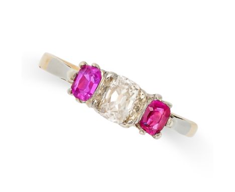 A THREE STONE RUBY AND DIAMOND RING in 18ct yellow gold and platinum, set with a cushion cut diamond of approximately 0.24 ca