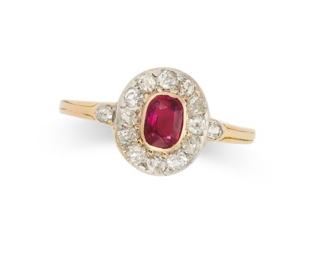 A RUBY AND DIAMOND CLUSTER RING in yellow gold, set with a cushion cut ruby of approximately 0.54 carats in a cluster of old 