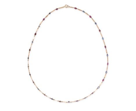 A SAPPHIRE AND RUBY NECKLACE in yellow gold, set with alternating cushion cut blue sapphires and rubies connected by baton li