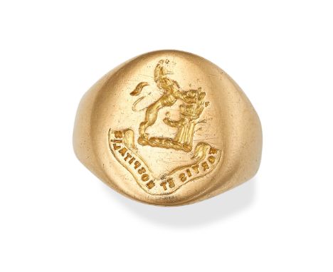 A VINTAGE GOLD SIGNET RING in 18ct yellow gold, the oval face with an engraved coat of arms and motto, stamped 18, size J / 4