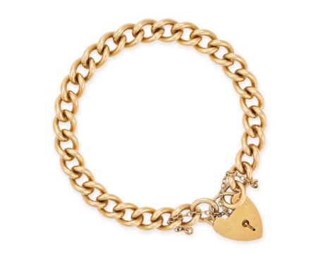 A VINTAGE PADLOCK BRACELET in 9ct yellow gold, comprising a series of curb links suspending a heart shaped padlock clasp, ful