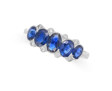 A SAPPHIRE AND DIAMOND RING in 18ct white gold, set with five graduated oval cut sapphires accented by round brilliant cut di