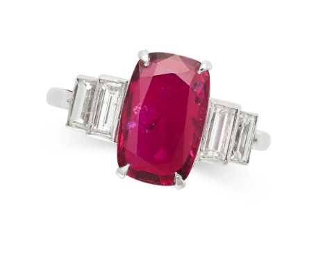 A RUBY AND DIAMOND RING set with a cushion cut ruby of approximately 1.51 carats, the stepped shoulders set with baguette cut