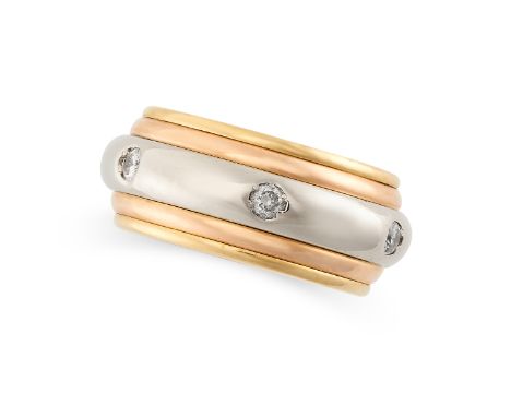 CARTIER, A DIAMOND SPINNING TRINITY ETERNITY RING in 18ct white, yellow and rose gold, the central spinning white gold band s