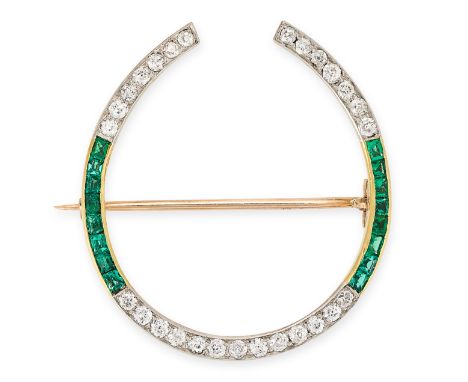 A FINE EMERALD AND DIAMOND HORSESHOE BROOCH in yellow gold and platinum, set with step cut emeralds and old cut diamonds, no 