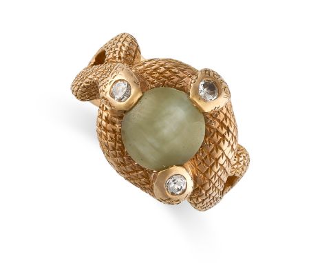 A CAT'S EYE CHRYSOBERYL AND DIAMOND SNAKE RING designed as three coiled snakes, surrounding a cat's eye chrysoberyl, accented