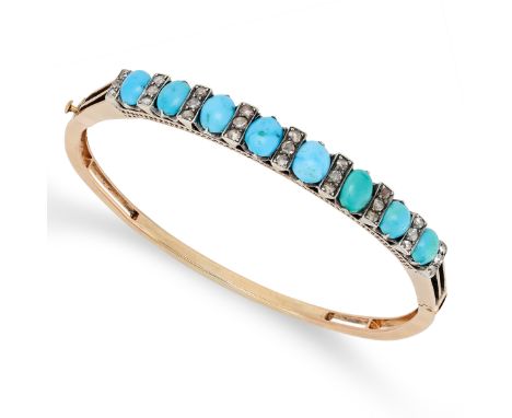 AN ANTIQUE TURQUOISE AND DIAMOND BANGLE in yellow gold and silver, the hinged bangle set with a row of graduated cabochon tur