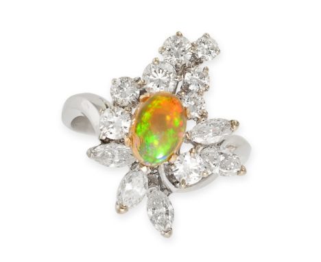 AN OPAL AND DIAMOND RING set with an oval cabochon opal accented by a spray of round brilliant and marquise cut diamonds tota