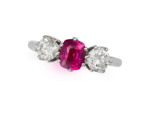 A FINE UNHEATED RUBY AND DIAMOND THREE STONE RING in 18ct white gold, set with a cushion cut ruby of 1.16 carats between two 