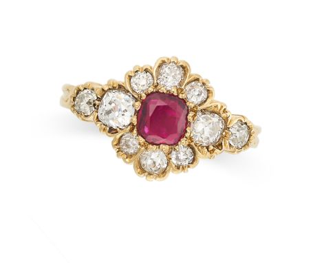 A RUBY AND DIAMOND CLUSTER RING in yellow gold, set with a cushion cut ruby of approximately 0.54 carats in a cluster of old 