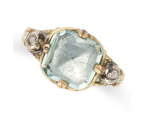 AN AQUAMARINE AND DIAMOND RING in yellow gold and silver, set with a cushion cut aquamarine of approximately 2.88 carats betw